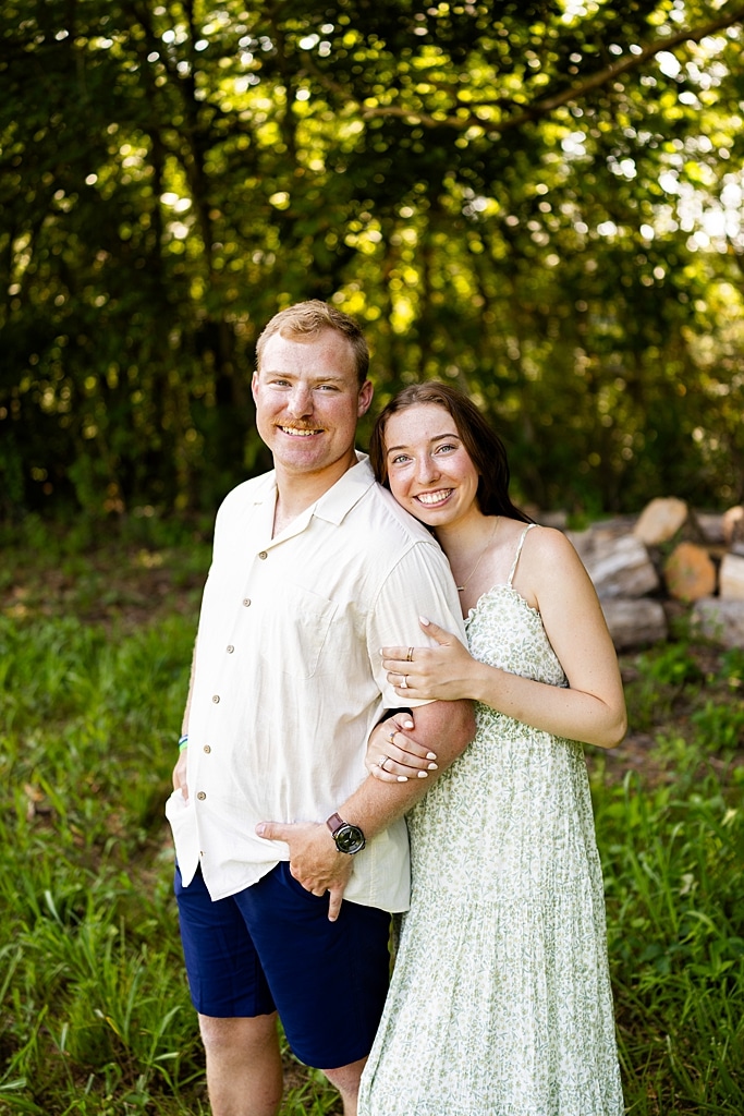 Groom to be proposing during surprise wedding proposal at family home | Emotional reaction during surprise wedding proposal at family home in Missouri | Couple celebrating after surprise wedding proposal at family home | Portraits of newly engaged couple after surprise wedding proposal